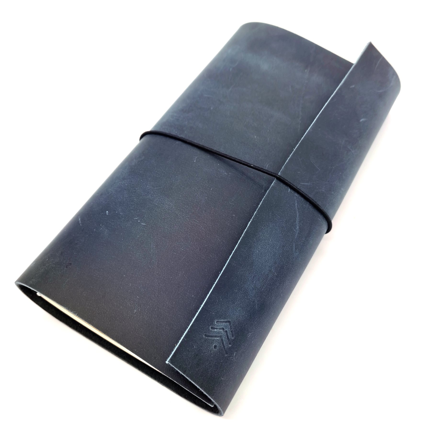 Standard size blue leather traveler's notebook with black elastic
